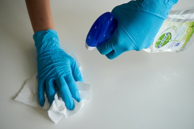 person cleaning the floor