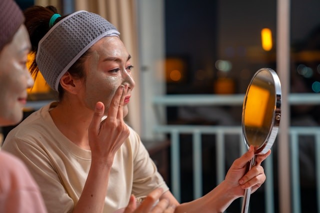 person making personal face treatment